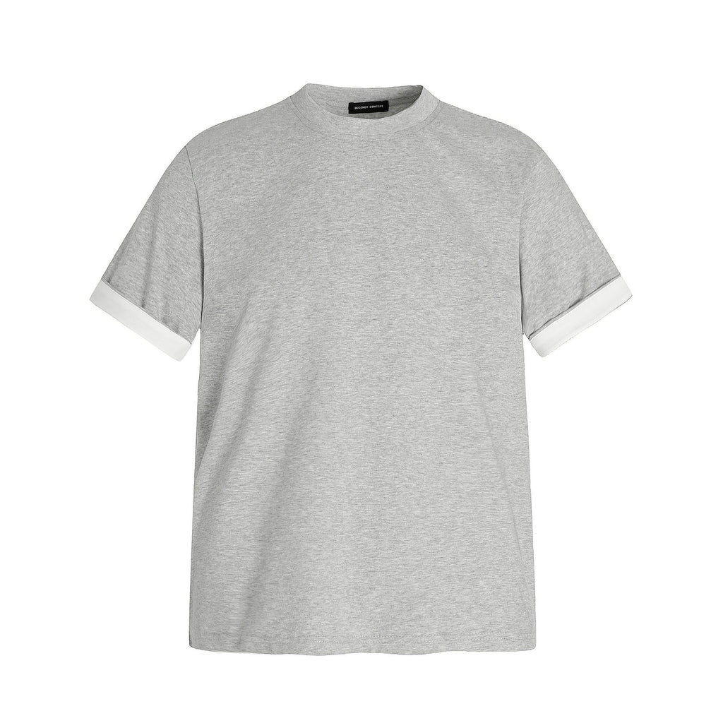 T-SHIRT UNISEX DA UOMO, DESIGN PATCHWORK DECOSTRUITO, VESTIBILITÀ ADERENTE, MANICHE CORTE.